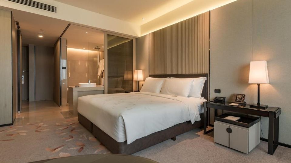 Rooms at Okura Prestige are warm and inviting.