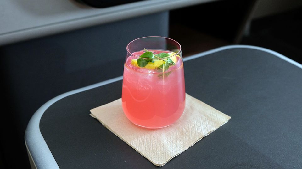 The Qantas Signature Sky Spritz in its watermelon-hued glory.