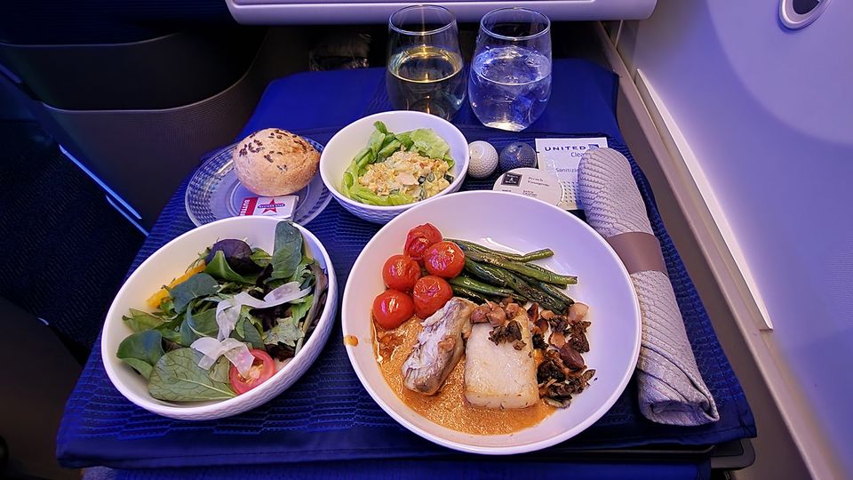 Coronation salmon, seared barramdundi and a side salad - all served at the same time.