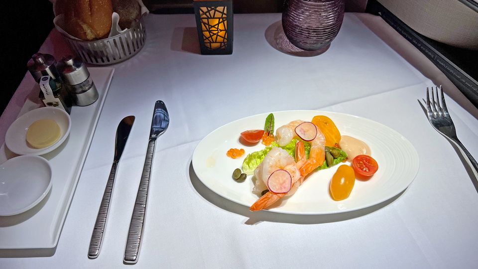 Butter poached Queensland prawns with marie rose, lettuce and heirloom tomaties.