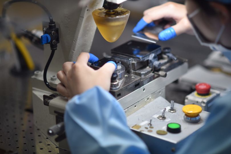 A watchmaker prints watch dials at the Shinshu Watch Studio.