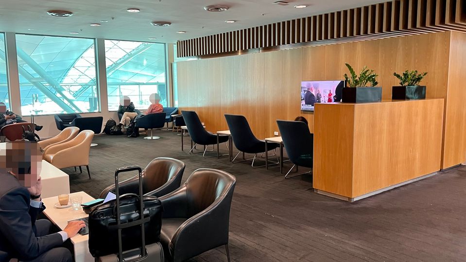 News is screened in a seating area behind reception.