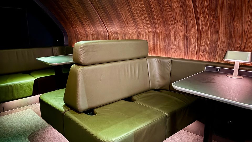 Passengers can relax at one of the table seating areas.