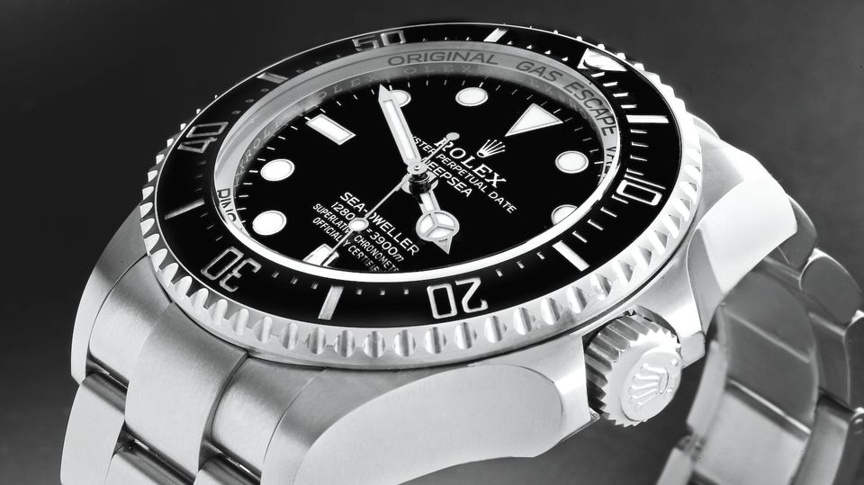 One of Kennedy's go-to watches for travelling is this versatile black-faced Rolex Deep Sea.